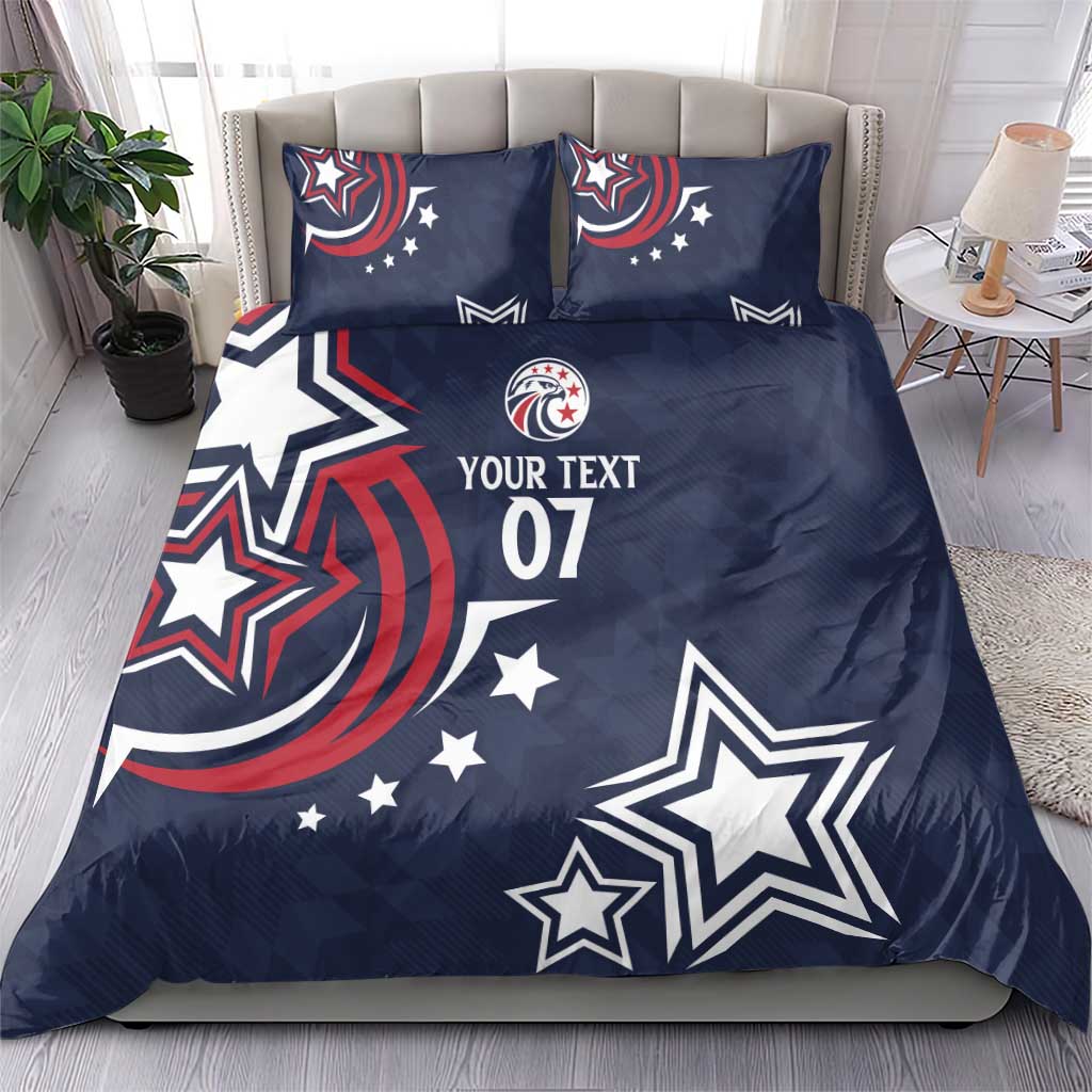 Dark blue duvet and two pillowcases with patriotic stars and 'YOUR TEXT 07' on bed