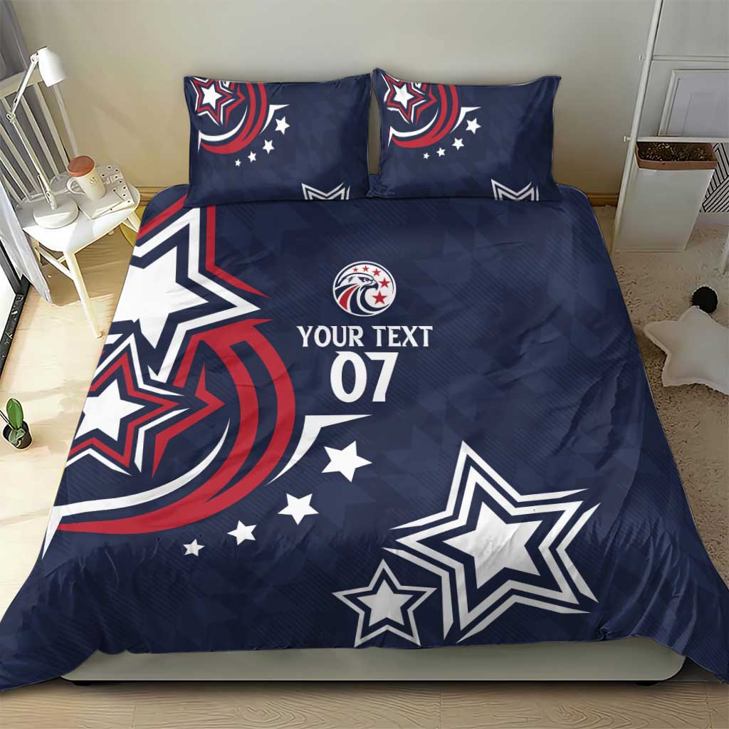 Dark blue duvet cover and two pillowcases with star emblems and 'YOUR TEXT 07'
