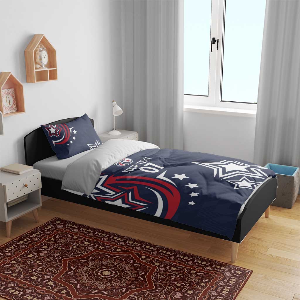 Dark blue bedding set with duvet and pillowcases featuring stars and 'YOUR TEXT 07'