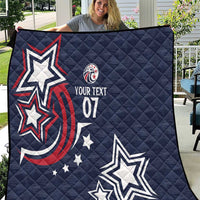 Navy-blue custom quilt with diamond quilting, patriotic stars, red wave, text 07