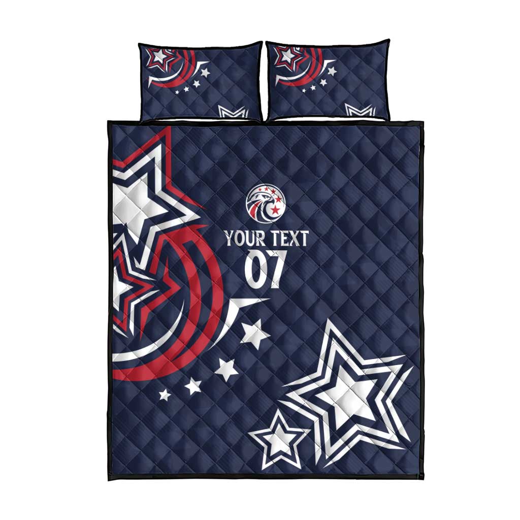 Blue quilt bed set with “YOUR TEXT 01,” star graphics, and two square pillows