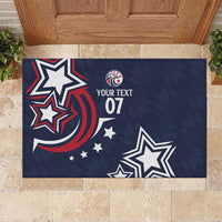 Blue rubber doormat featuring star and stripe artwork with 'YOUR TEXT 07' center