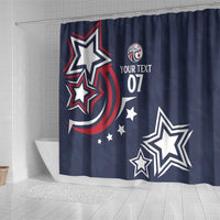 Blue shower curtain with large stars, red swirl, and 'YOUR TEXT 07' design
