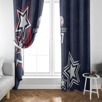 Navy blue window curtains with star graphics on both panels and a printed text area