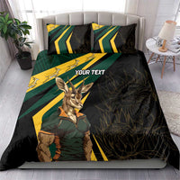 Black bedding set with springbok mascot, green/yellow stripe chevrons, and 'YOUR TEXT' pillows