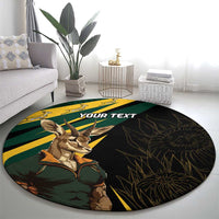 Round carpet featuring springbok mascot, green-and-yellow rays and dark foliage print