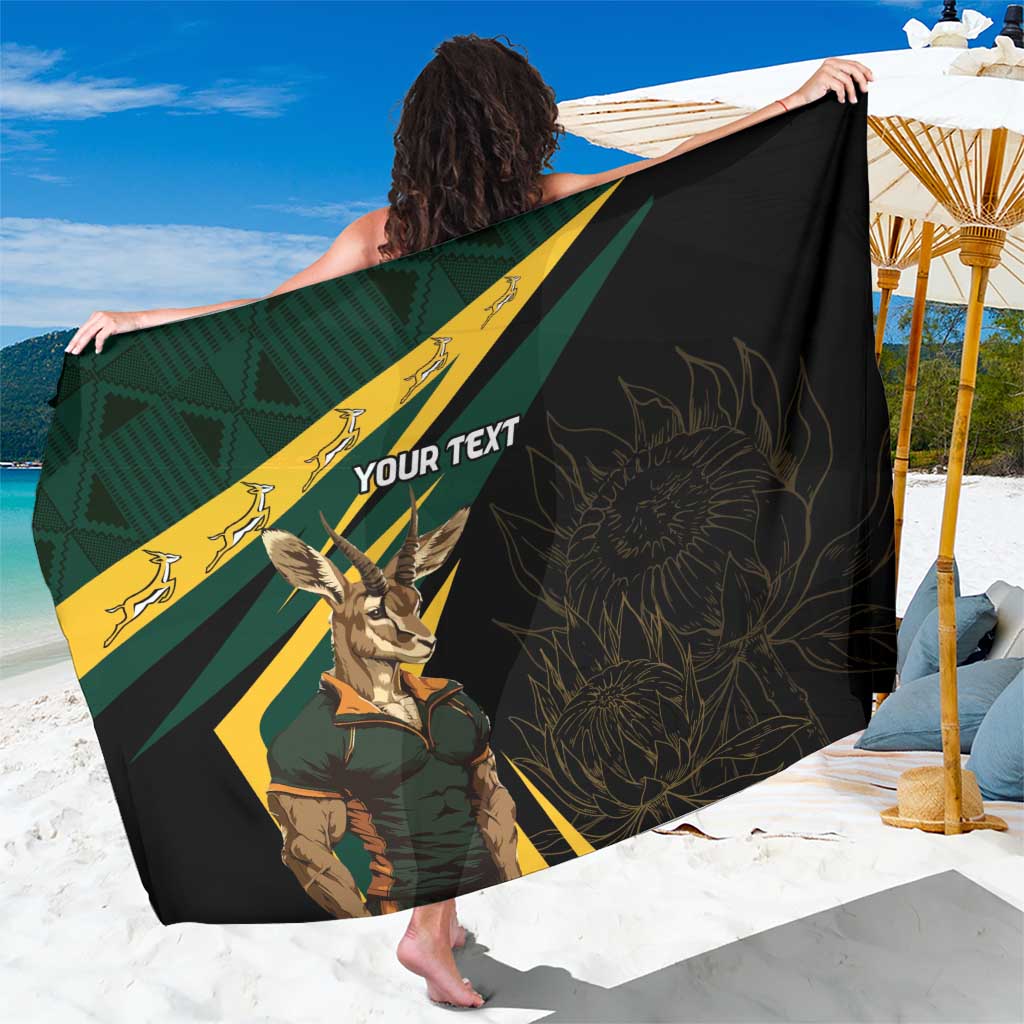 Black personalised sarong with Springbok mascot, green/yellow border, and 'YOUR TEXT' print