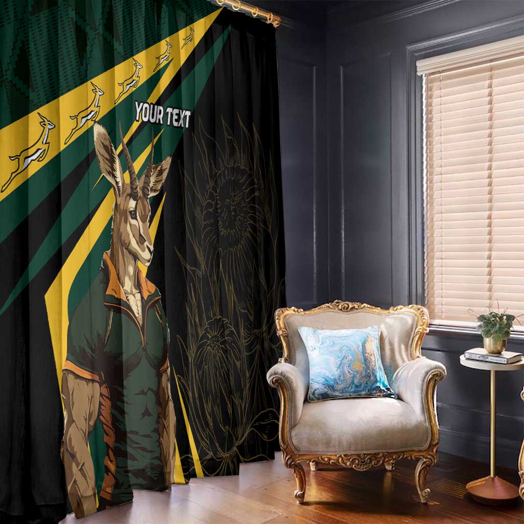 Window curtain pair with springbok mascot and custom text, green-and-yellow stripes on one panel, dark panel with patterns.