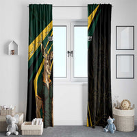 Full-length window curtains with green and black sides, yellow diagonal stripe accents, springbok mascot print.