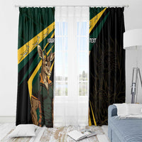 Window curtains with springbok artwork and custom text, green panel and dark panel with ornate line pattern.