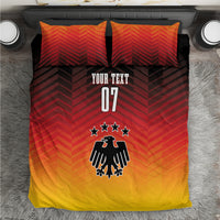 Germany football bedding set on bed: black and red chevron duvet with “YOUR TEXT 07”