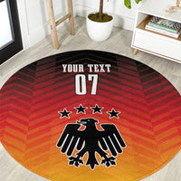 Round Germany football carpet, close-up view of eagle, stars, red chevrons and 'YOUR TEXT 07'.