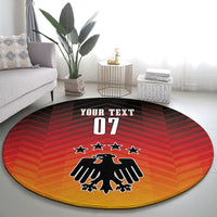 Germany round football carpet with eagle emblem, three stars, red chevrons and 'YOUR TEXT 07'.