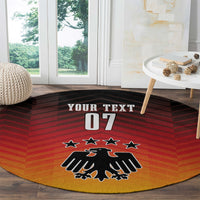 Round Germany football carpet, dark maroon chevrons, eagle badge, stars and 'YOUR TEXT 07'.