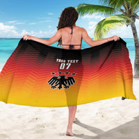 Football sarong with black-red-yellow gradient, YOUR TEXT 07 and eagle crest