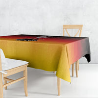 Square yellow tablecloth with red-and-black graphic Germany emblem centerpiece