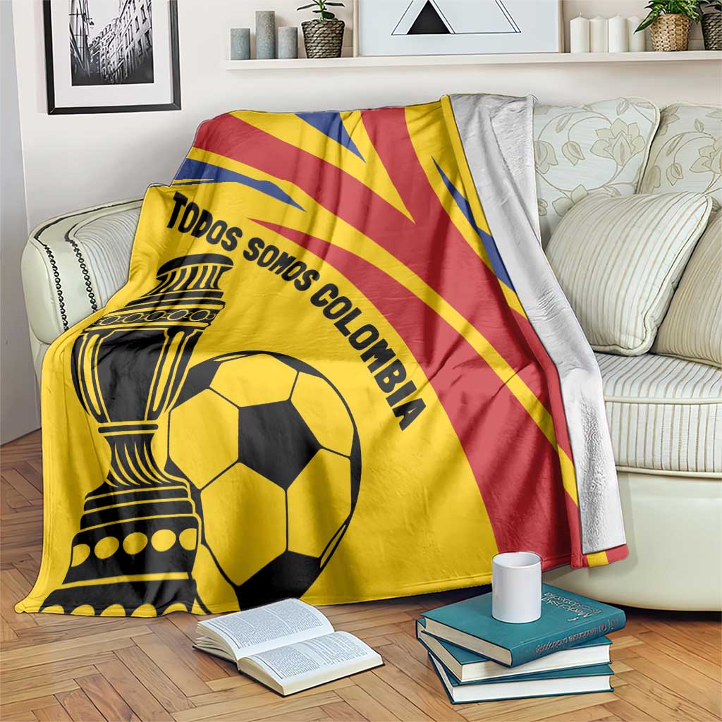Colombia football blanket, gold with red and blue diagonal stripes and trophy soccer print