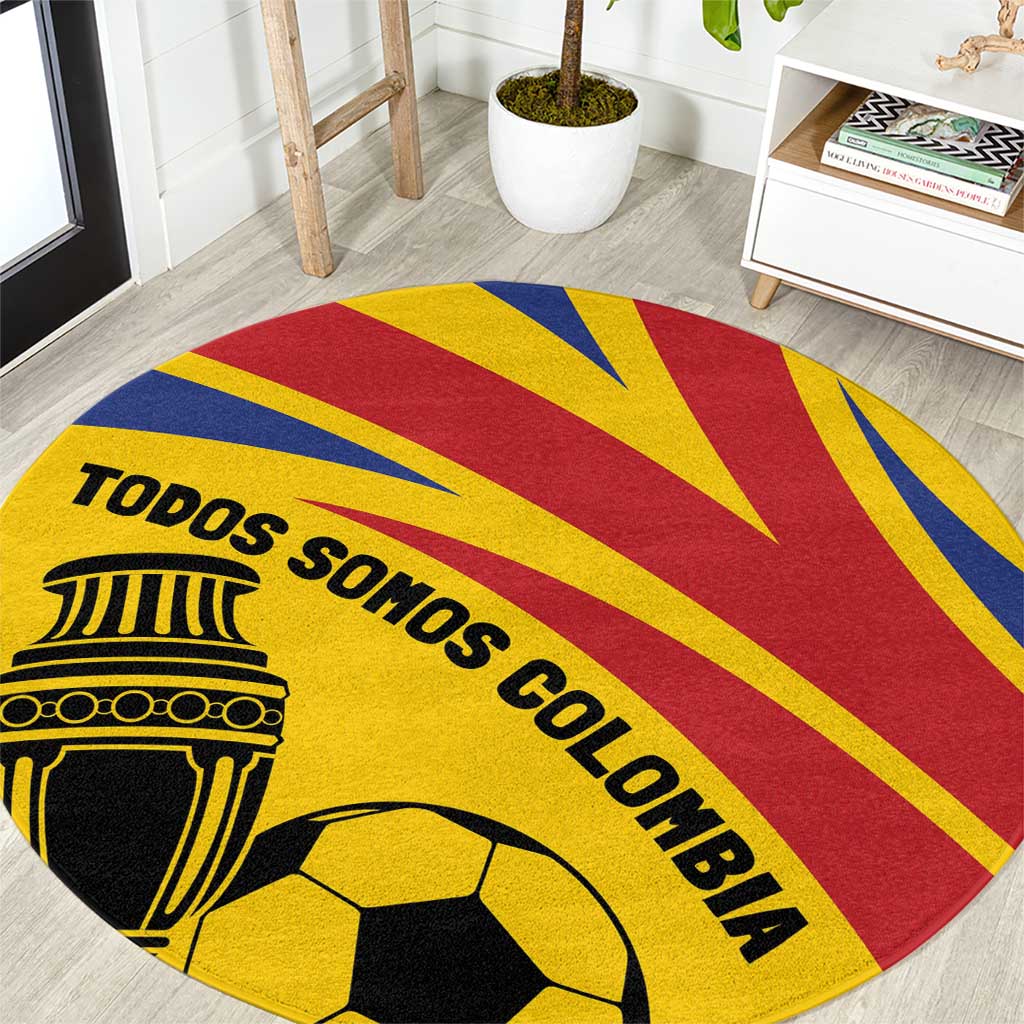 Round football carpet with Colombia colors, soccer ball, and 'TODOS SOMOS COLOMBIA'.
