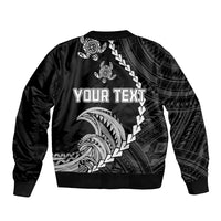 Black bomber jacket with tribal wave/turtle art and centered 'YOUR TEXT' print