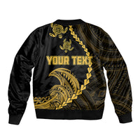 Black bomber jacket with gold tribal wave graphic and back text design, ribbed hem