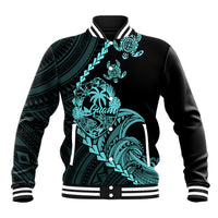 Black baseball jacket with turquoise Guam turtle tribal graphic, striped collar and cuffs