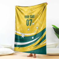 Yellow and green custom blanket with “YOUR TEXT 07” and white and teal star accents