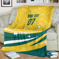 Yellow custom blanket with green wave stripes, “YOUR TEXT 07,” and star motifs