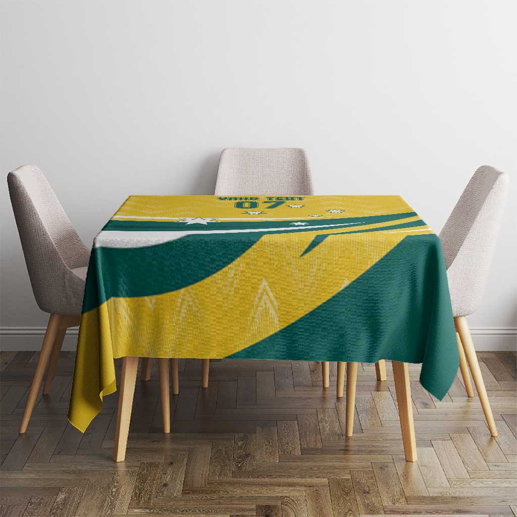 Custom tablecloth with yellow and green geometric stripes on rectangular table