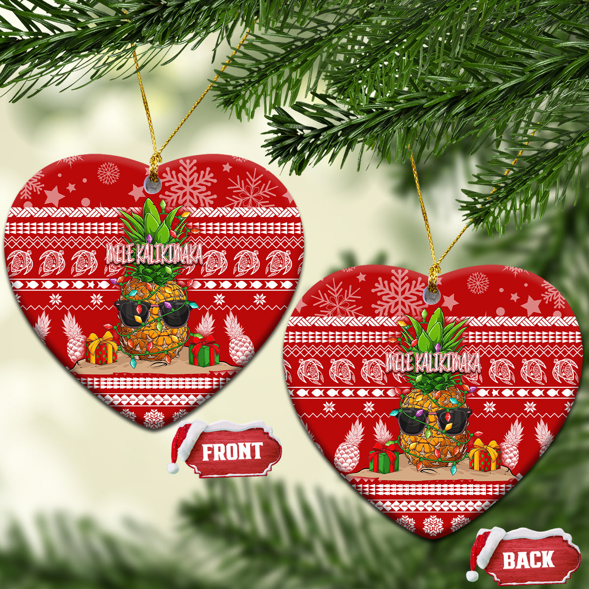 Red ceramic heart-shaped Christmas ornaments with pineapple scene and “Mele Kalikimaka”