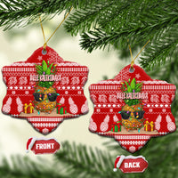 Red ceramic snowflake-shaped Christmas ornaments with pineapple design and “Mele Kalikimaka”