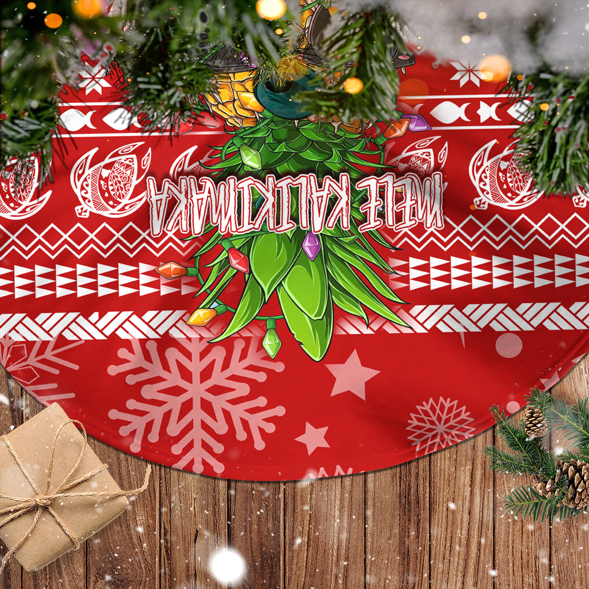 Red Christmas tree skirt fabric with pineapple/foliage graphic, hearts, snowflakes