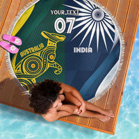 Round beach blanket with white fringe; green Australia kangaroo and blue India motif with '07'