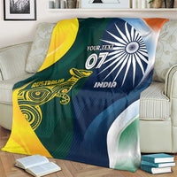 Cricket blanket on couch, Australia emblem on left and India wheel on right, 'YOUR TEXT'.