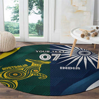 Round area rug featuring Australia emblem on green left and India sunburst on blue right
