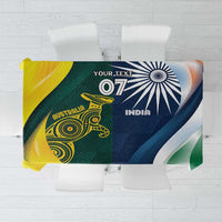 Cricket themed tablecloth with half Australia and half India flags, green yellow and blue.