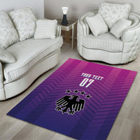 Rectangular purple and magenta patterned area rug with German crest, stars, and 'YOUR TEXT 07'