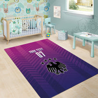 Rectangular purple and magenta patterned area rug with German crest, stars, and 'YOUR TEXT 07'
