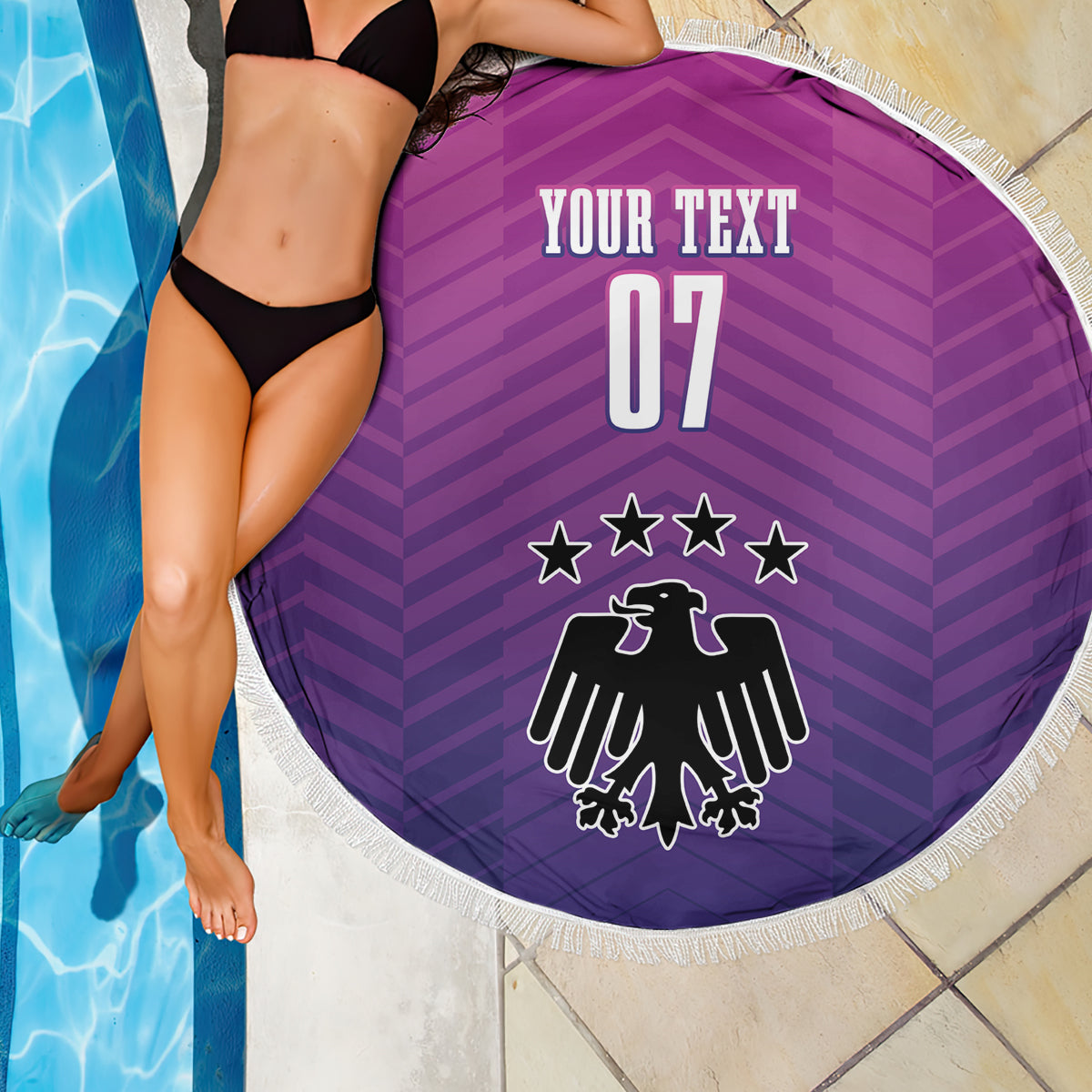Round purple beach blanket with fringe edge, 'YOUR TEXT 07' eagle emblem centered