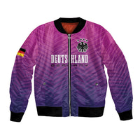 Unisex purple football bomber jacket with full zip, striped cuffs, and team crest