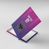 Framed Germany football canvas wall art in pink purple, diagonal view of 07 and eagle crest