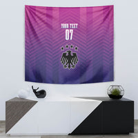 Pink and purple Germany football tapestry featuring emblem, stars, and number 07