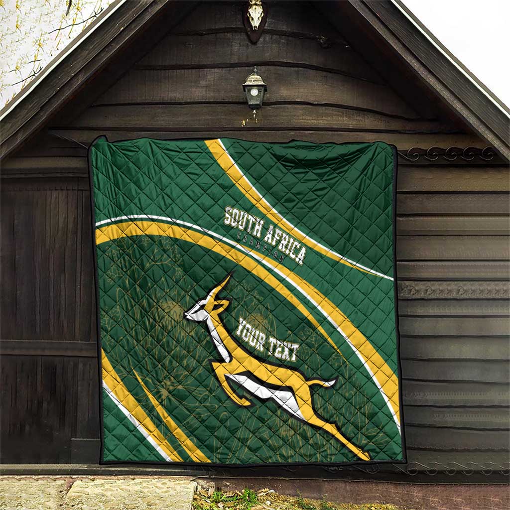Dark green quilt with South Africa banner design, Bokke emblem, and custom text on quilt top