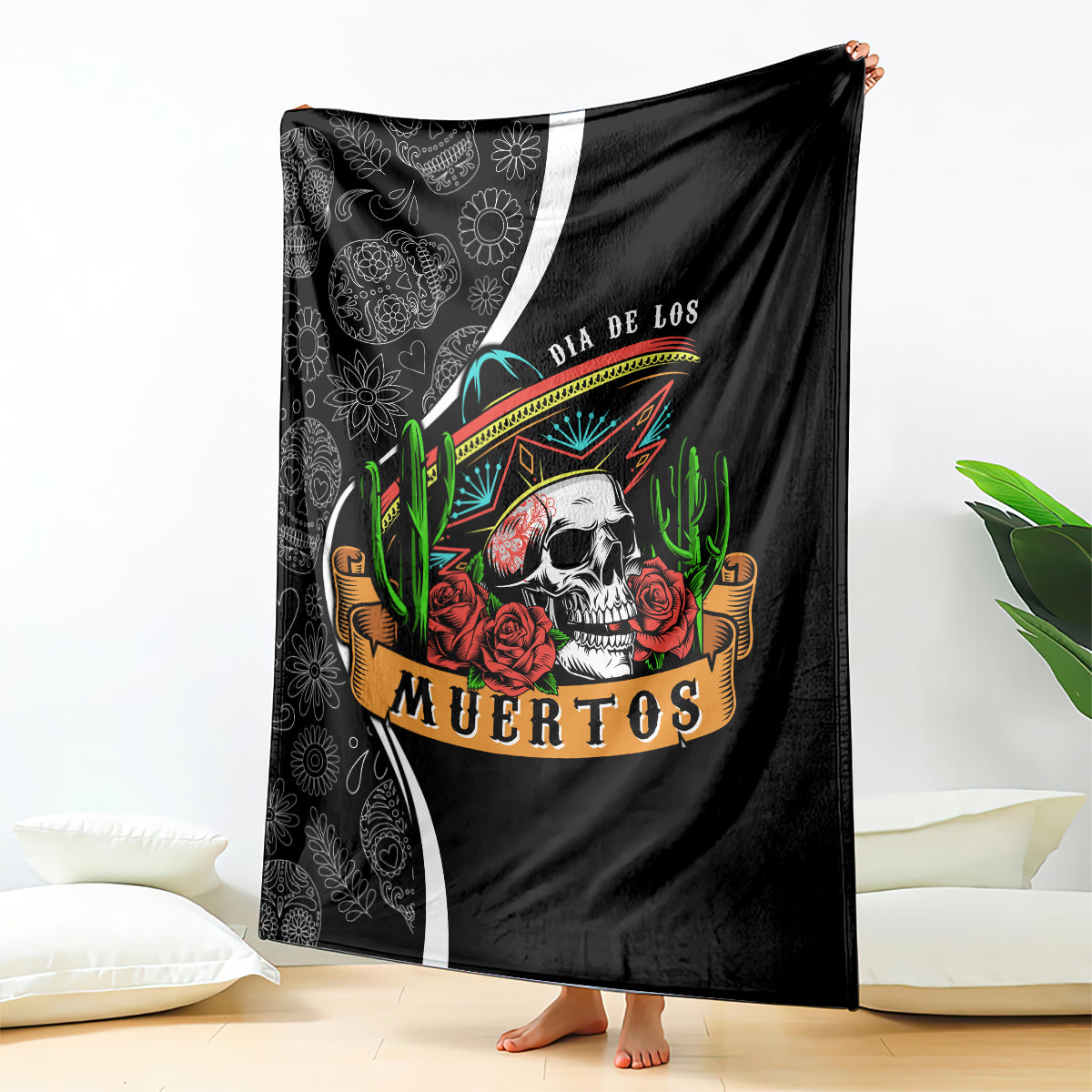 Black Dia de los Muertos blanket with skull, roses, cacti, and white curved side stripes