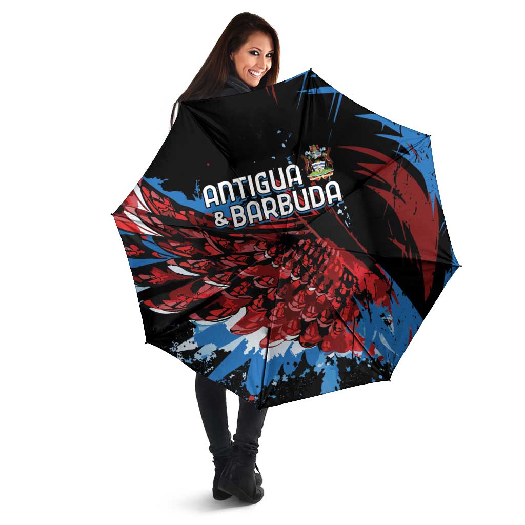 Black umbrella with Antigua & Barbuda logo and red/blue wing graphic, held open