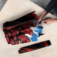 Folded umbrella with red and blue wing print and Antigua & Barbuda logo