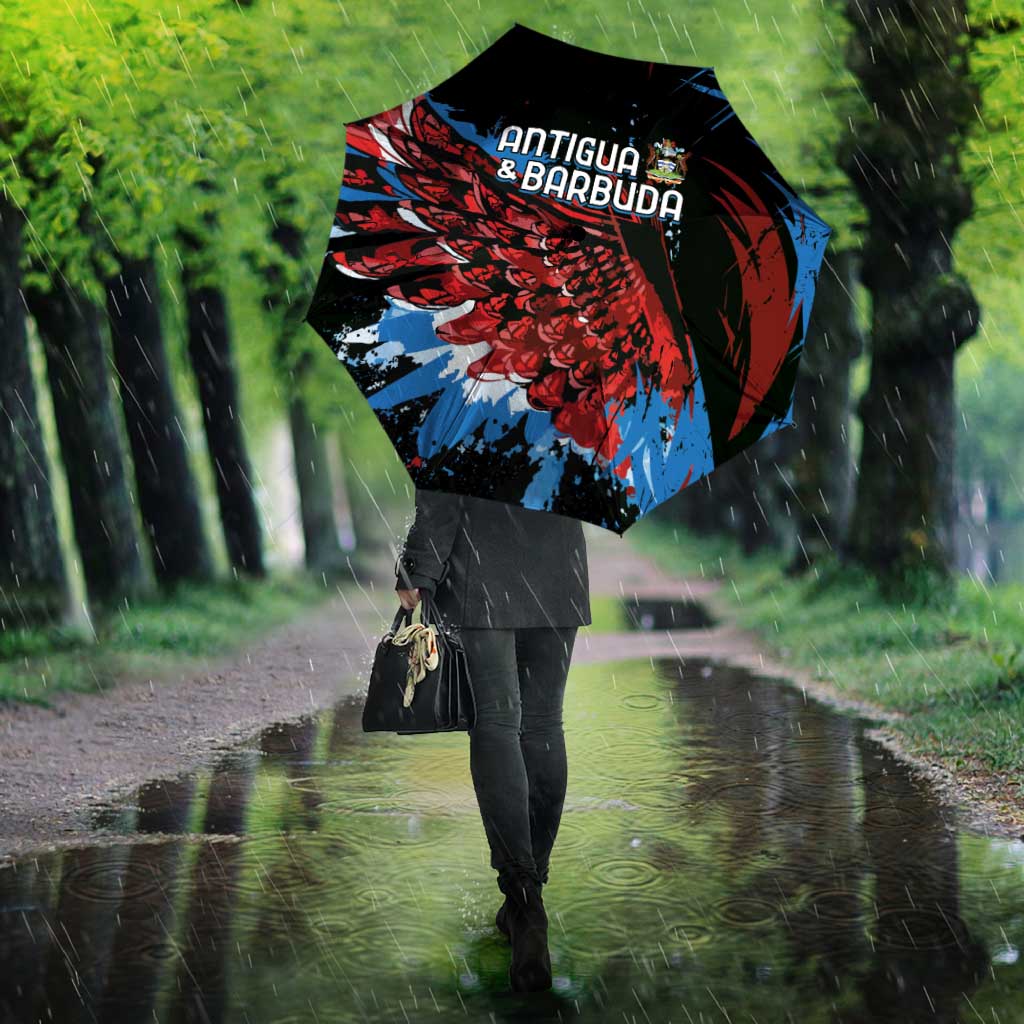 Black cricket umbrella with Antigua & Barbuda logo and red/blue wing artwork