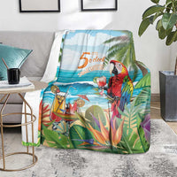 Tropical throw blanket on the floor, featuring red parrot, cocktail, and palm leaves