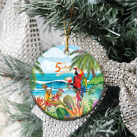 Round ceramic Christmas ornament with colorful tropical parrot and ocean “5 o’clock somewhere”
