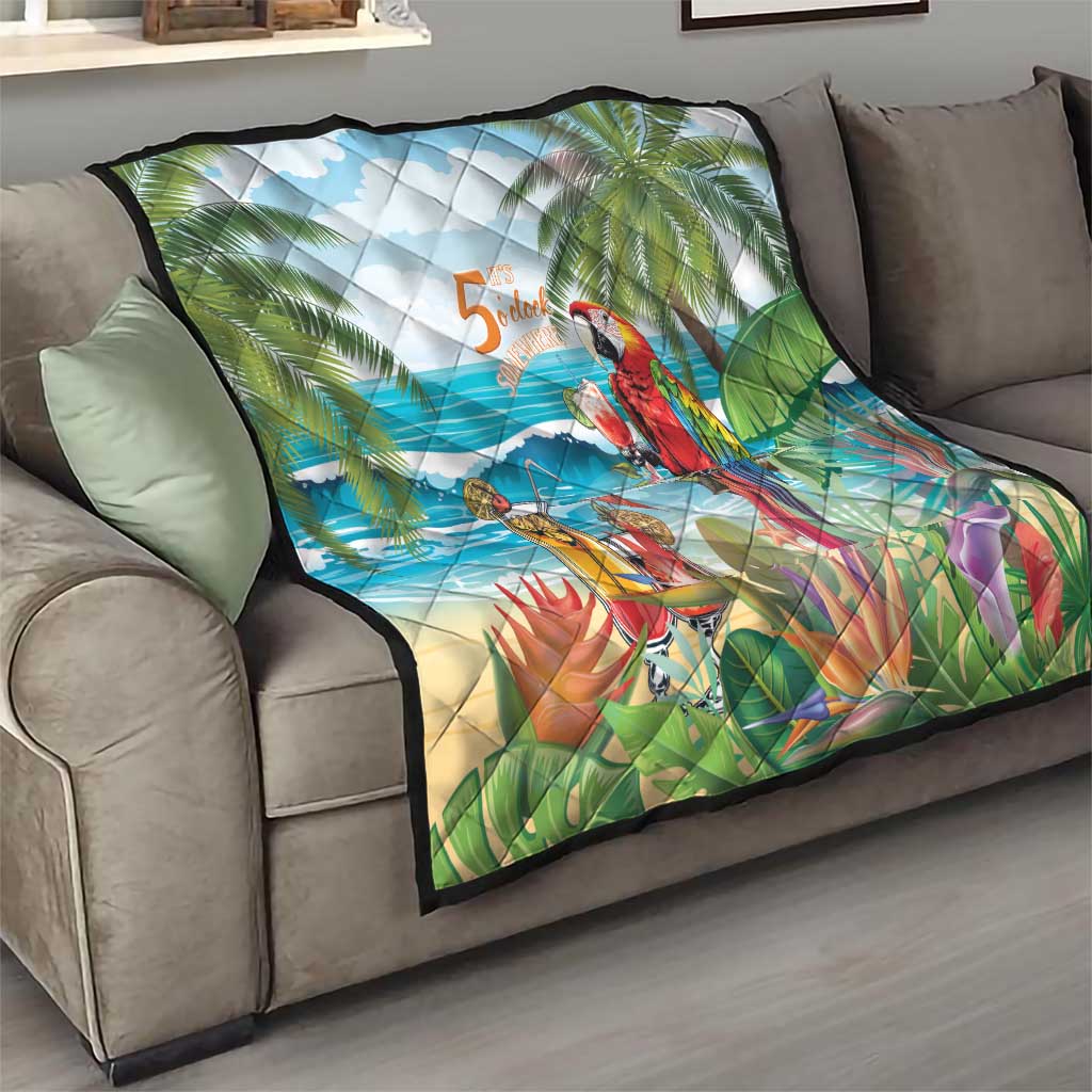 Tropical quilt draped on sofa, parrot, ocean waves, palm leaf pattern, and '5 o'clock'