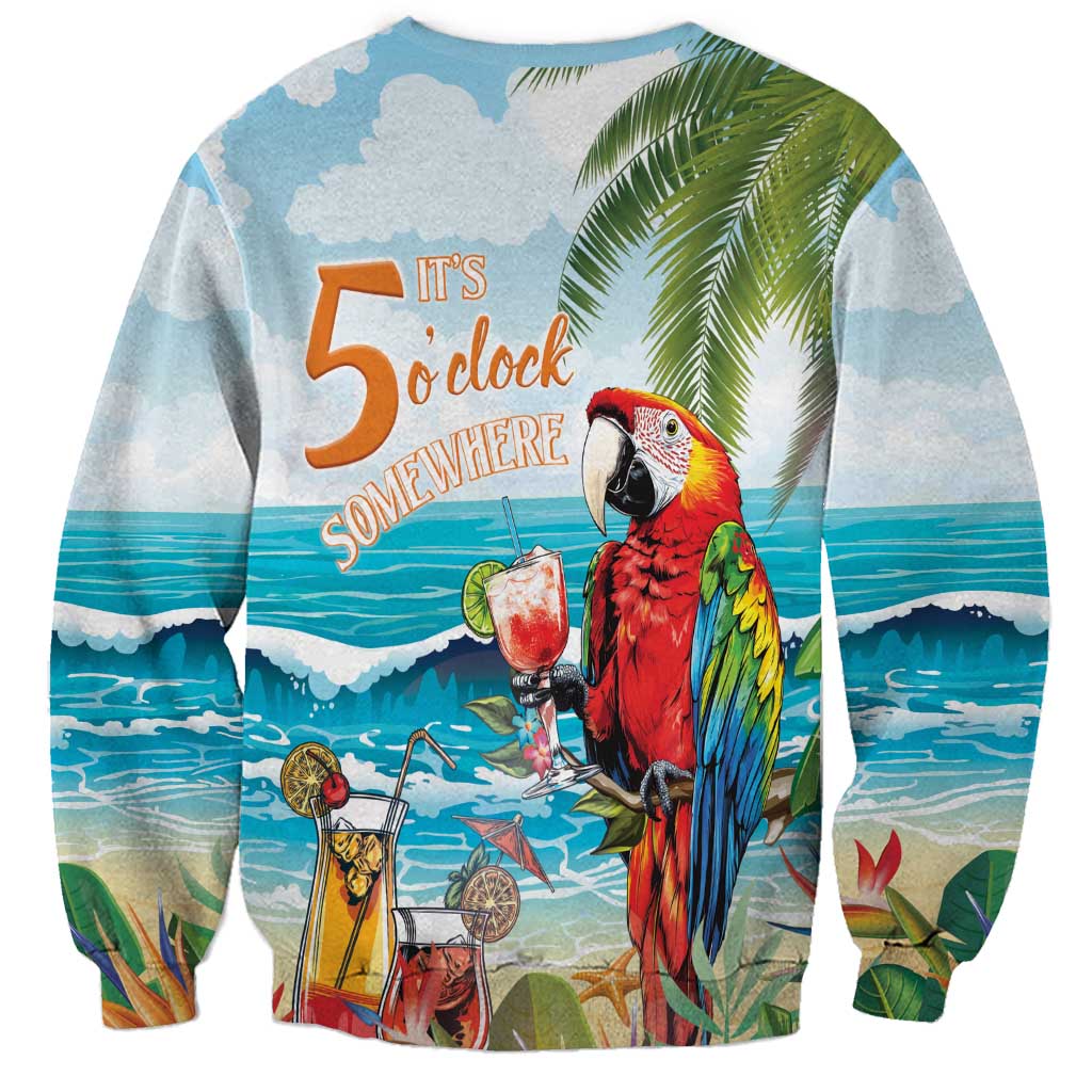 Unisex light blue sweatshirt with large parrot holding cocktail, tropical island scene graphic
